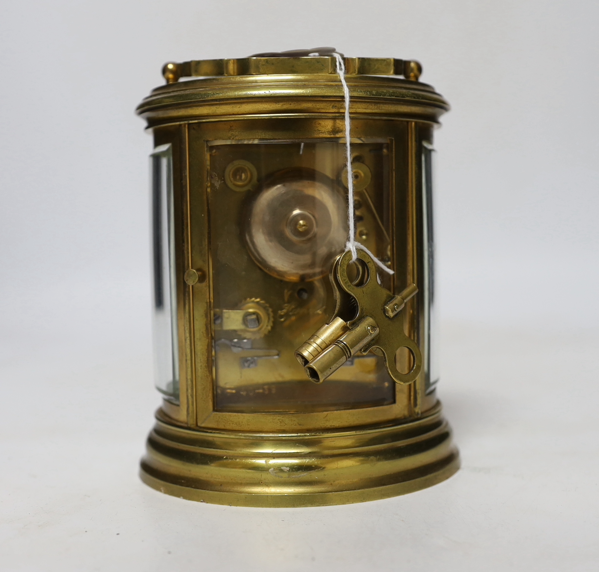 A late 19th century French oval brass cased eight day carriage clock